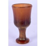 A 19TH CENTURY CHINESE CARVED RHINOCEROS HORN GOBLET of tiny proportions. 14 grams. 4.75 cm high.