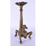 A RARE 17TH/18TH CENTURY EUROPEAN ARMORIAL BRONZE CANDLESTICK formed as a beast holding a shield. 18