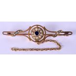 A VICTORIAN 15CT GOLD SAPPHIRE AND SEED PEARL BAR BROOCH. 3.6 grams. 5 cm x 1 cm.