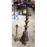 TWO LARGE 17TH/18TH CENTURY CONTINENTAL PRICKET CANDLESTICKS. Largest 130 cm high. (2)