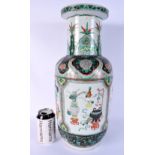 A LARGE 19TH CENTURY CHINESE FAMILLE VERTE ROULEAU VASE Kangxi style, painted with precious objects.