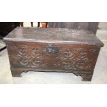 AN 18TH CENTURY CONTINENTAL FRUIT WOOD COFFER decorated with motifs. 102 cm x 52 cm x 46 cm.