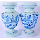 A PAIR OF VICTORIAN PAINTED OPALINE GLASS VASES possibly Stourbridge. 21 cm high.