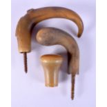 THREE 19TH CENTURY MIDDLE EASTERN CARVED RHINOCEROS HORN WALKING CANE HANDLES. 205 grams. 10.5 cm x