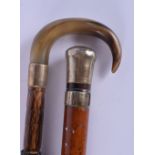 A REGENCY MALACCA WALKING CANE together with a horn handled parasol. Largest 90 cm long. (2)