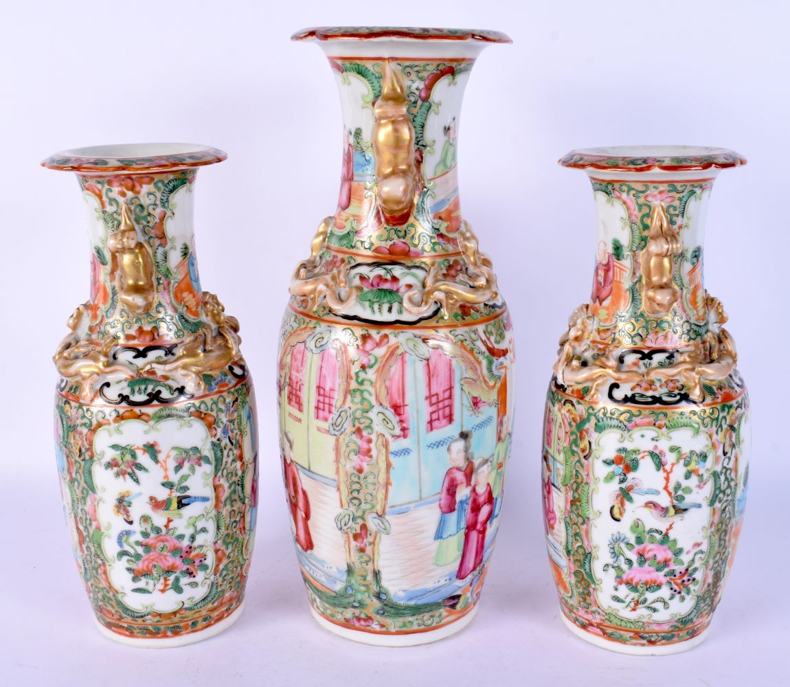 A SET OF THREE 19TH CENTURY CHINESE CANTON FAMILLE ROSE VASES Qing. Largest 28 cm high. (3) - Bild 4 aus 25