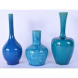 TWO 19TH CENTURY CHINESE BLUE GLAZED PORCELAIN BOTTLE NECK VASES together with a similar smaller vas