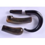 FOUR 19TH CENTURY MIDDLE EASTERN CARVED RHINOCEROS HORN WALKING CANE HANDLES. 262 grams. 10.5 cm x 8