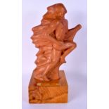 A STYLISH POTTERY FIGURE OF A ROAMING NUDE upon a plinth. 33 cm x 14 cm.