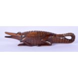 AN 18/19TH CENTURY EUROPEAN CARVED FRUITWOOD TREEN SNUFF NUT CRACKER in the form of a crocodile. 17