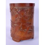 A FINE 19TH CENTURY JAPANESE MEIJI PERIOD CARVED BAMBOO BRUSH POT decorated with samurai fighting. 1