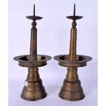 A PAIR OF ANTIQUE BRASS PRICKET CANDLESTICKS. 28 cm high.