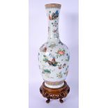 A CHINESE FAMILLE ROSE PORCELAIN VASE 20th Century, bearing Qianlong marks to base. 26 cm high.