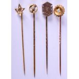 FOUR ANTIQUE GOLD STICK PINS. 5.6 grams. Largest 6.5 cm x 1 cm. (4)