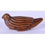 AN 18/19TH CENTURY EUROPEAN CARVED FRUITWOOD TREEN SNUFF BOX in the form of a bird. 8.5 cm x 3.5 cm.