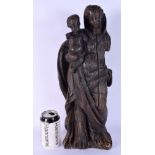 A RARE 16TH/17TH CENTURY EUROPEAN CARVED WOOD FIGURE OF A SAINT modelled as the Madonna and child. 4