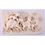 A FINE 19TH CENTURY EUROPEAN DIEPPE CARVED IVORY RECTANGULAR PLAQUE depicting figures on horseback.