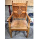 AN ARTS CRAFTS GOTHIC REVIVAL CARVED OAK CHAIR. 107 cm x 59 cm x 47 cm.