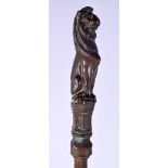 A GEORGE III BRONZE LION FIRE SIDE IMPLEMENT. 60 cm long.