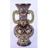 A 19TH CENTURY CHINESE TWIN HANDLED CLOISONNE ENAMEL VASE decorated with birds and foliage. 20 cm hi