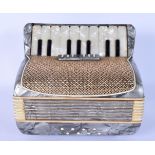 A RARE 1950S ITALIAN ACCORDION CIGARETTE DISPENSER with extending body. 17 cm x 17 cm.