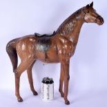 A VINTAGE COUNTRY HOUSE LEATHER FIGURE OF A HORSE. 50 cm x 36 cm.