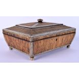 A LARGE 19TH CENTURY ANGLO INDIAN IVORY AND PORCUPINE QUILL CASKET decorated all over with foliage.