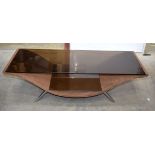 A RETRO GLASS TOP TABLE. 37 cm x 118 cm x 45 cm.