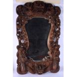 A LOVELY EARLY 20TH CENTURY BURMESE ASIAN CARVED WOOD MIRROR decorated in relief with buddhistic sco