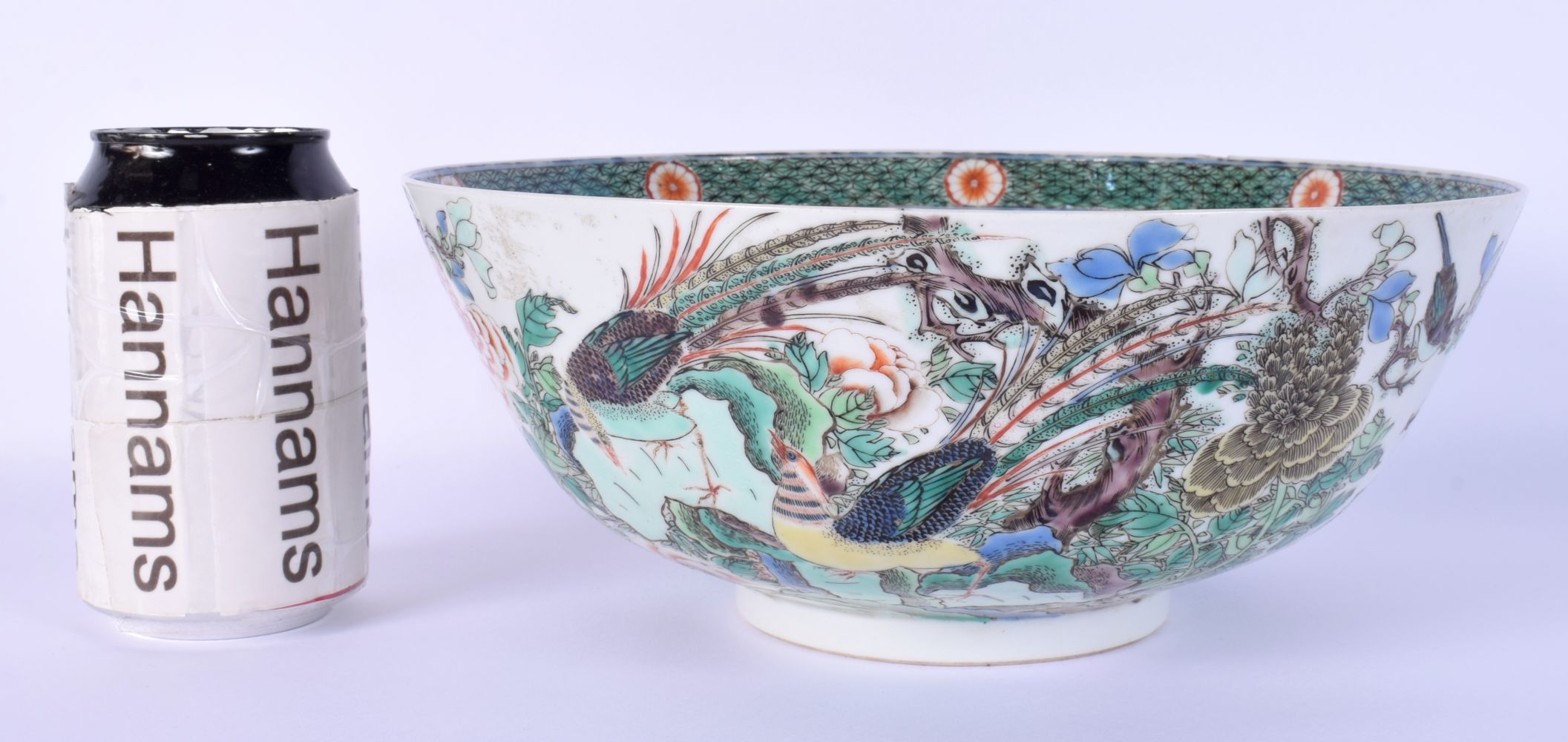 A LARGE EARLY 18TH CENTURY CHINESE FAMILLE VERTE PORCELAIN BOWL Late Kangxi, painted with bold folia