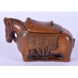 AN 18/19TH CENTURY EUROPEAN CARVED FRUITWOOD TREEN SNUFF BOX in the form of a horse. 8 cm x 5.5 cm.