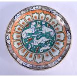 A TURKISH MIDDLE EASTERN FAIENCE DISH painted with animals. 27 cm diameter.