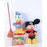 A collection of vintage Disney toys & memorabilia including an 8 mm Super 8 film tape of mighty mous