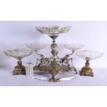 A RARE LARGE WMF SILVER PLATED CUT AND GILDED GLASS GARNITURE formed as griffins upon shells. Larges