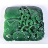 A Chinese carved Jade boulder in the form of a fruiting pod 7.5 x 7.5 cm.