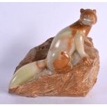 A CONTINENTAL CARVED ONYX SQUIRREL. 28 cm x 10 cm.