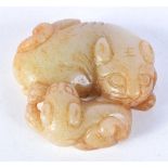 A carved jade boulder in the form of two beast 5.5 cm .