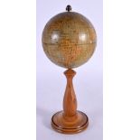 AN UNUSUAL ANTIQUE MINIATURE GLOBE. 18 cm high.