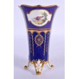 Royal Crown Derby vase on four feet with blue and green ground painted with a bird in landscape by G