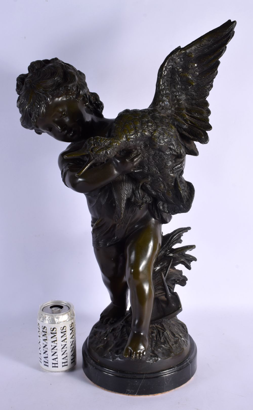 French School (20th Century) Bronze, Boy holding a howling duck. 54 cm x 22 cm.