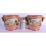 A PAIR OF 19TH CENTURY FRENCH PARIS PORCELAIN JARDINIERES painted with putti in various pursuits. 20