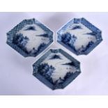 A SET OF THREE 19TH CENTURY JAPANESE MEIJI PERIOD BLUE AND WHITE DISHES painted with landscapes. 15