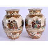 A FINE PAIR OF 19TH CENTURY JAPANESE MEIJI PERIOD SATSUMA VASES painted with figures and butterflies