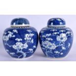 A MATCHED PAIR OF 19TH CENTURY CHINESE BLUE AND WHITE GINGER JARS Kangxi style. 15 cm x 11 cm.