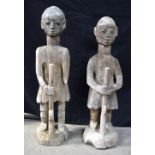 A pair of large Nigerian wooden tribal figures 94cm. (2).