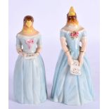 Royal Worcester candle snuffers modelled as Confidence and Diffidence with matching blue dresses. 11