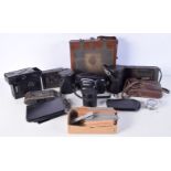 A quantity of vintage cameras and camera equipment, including lenses. (13).