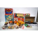 A collection of boxed children's games, Britains model vehicles and animals etc . (Qty).