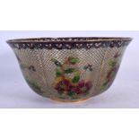AN EARLY 20TH CENTURY JAPANESE MEIJI PERIOD PLIQUE A JOUR BOWL decorated with foliage. 16 cm wide.