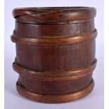 A TREEN CARVED WOOD SLIDING BARREL BOX AND COVER. 11 cm x 9 cm.